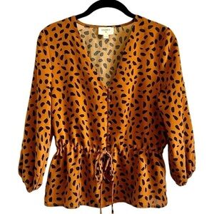 EVERLY,NWOT,PEPLUM,LEOPARD PRINT BLOUSE IN PUMPKIN COLOR WITH BLACK DOTS.SIZE S